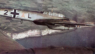 A Bf 110 flying over the the cliffs of Dover on the English coast. (San Diego Air and Space Museum)
